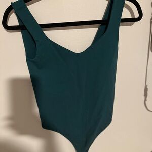 Free People Intimately One-Piece thong Bodysuit in deep green. - M/L